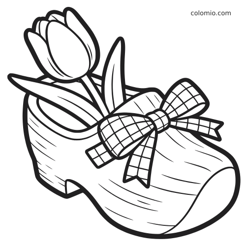 A simple black-and-white tulip arranged in a wooden Dutch clog, tied with a large checkered ribbon bow.